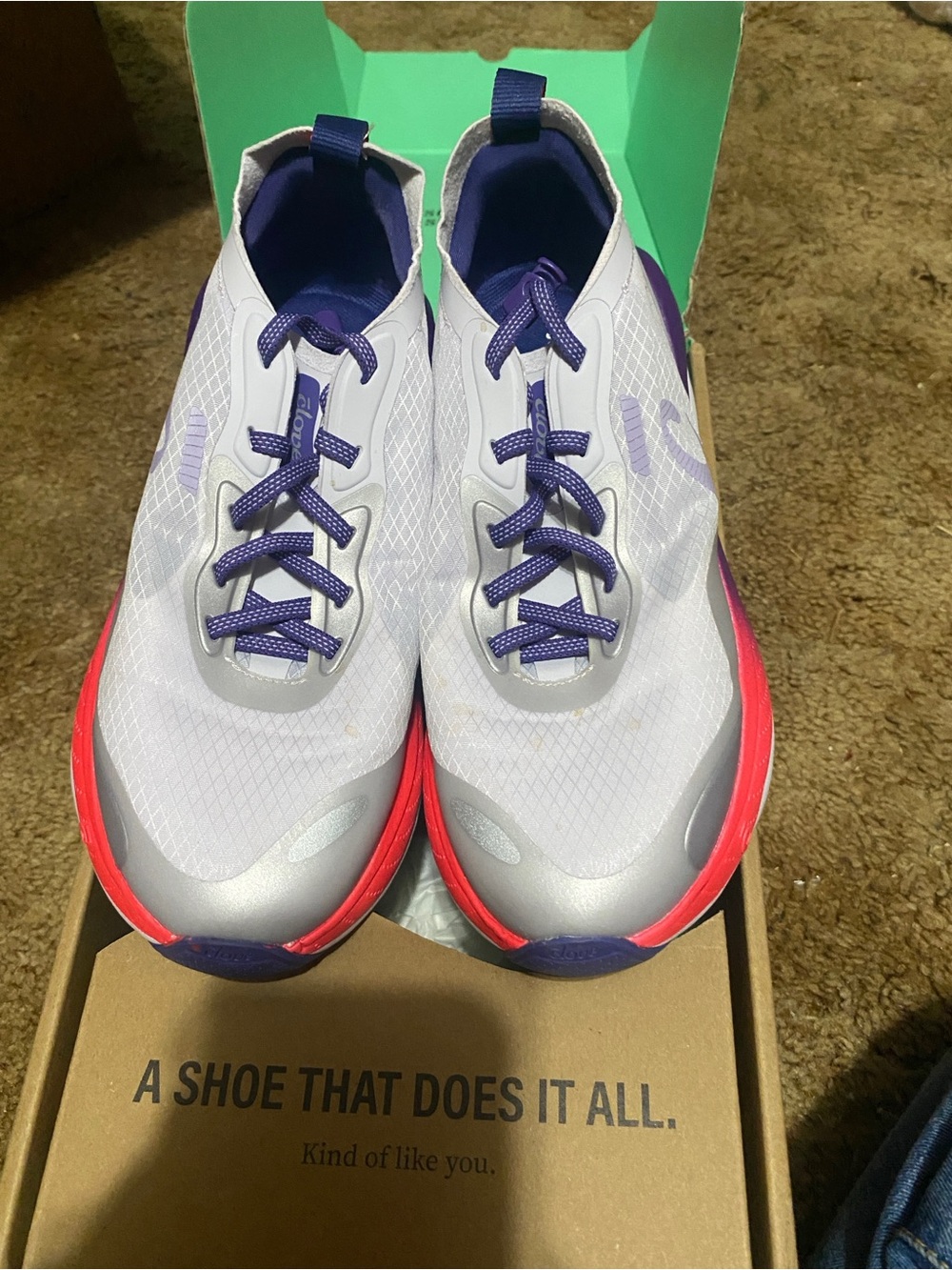 White Sneakers with Purple Accents and Pink Midsole